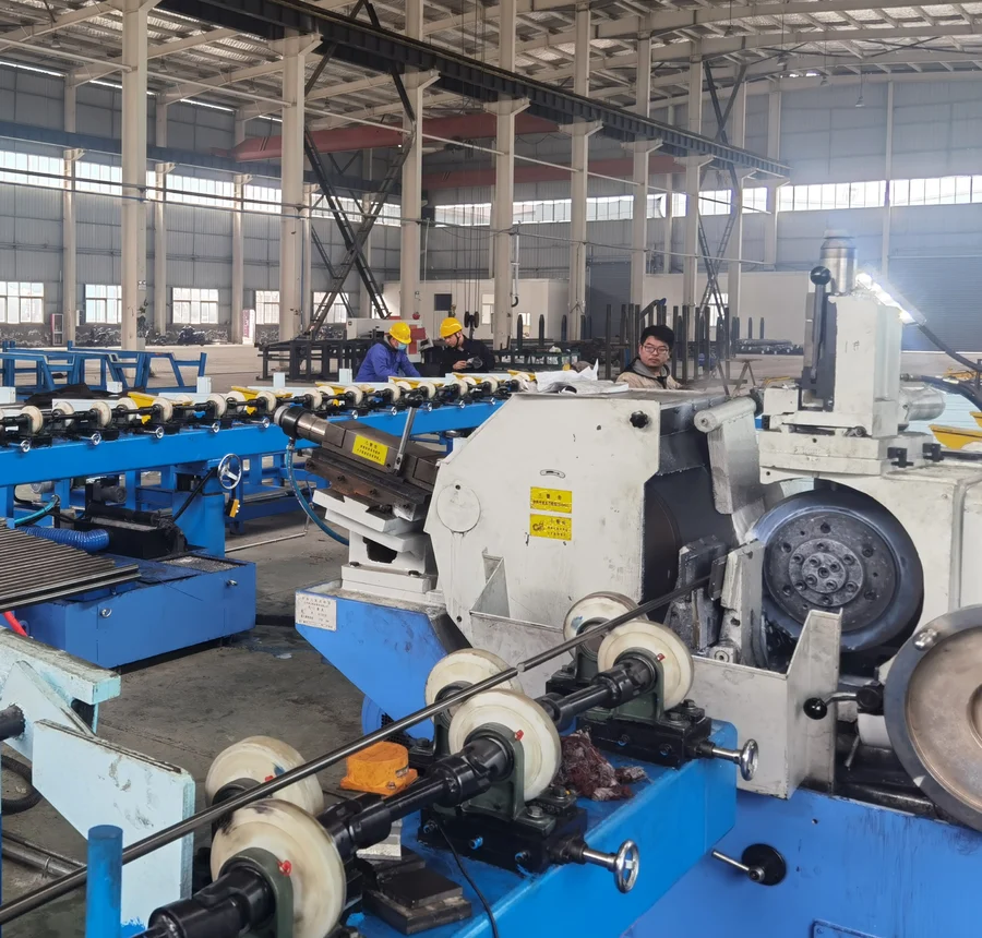 Steel bars passing through grinding equipment and support rollers