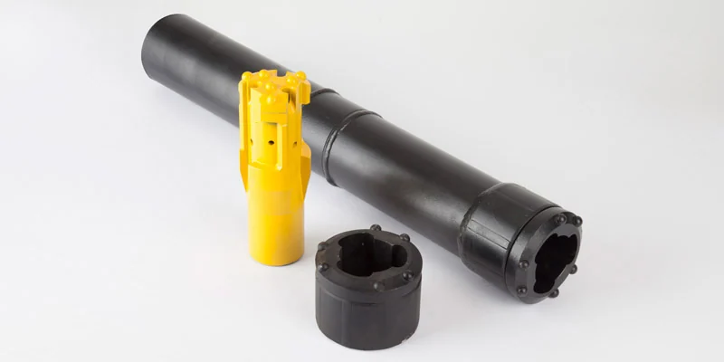 Manufacturer photograph of a canopy starter pipe, ring and pilot drilling components
