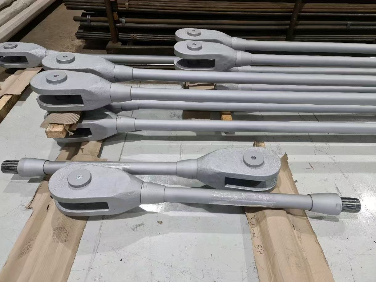 Finished tension assemblies with forked end connections