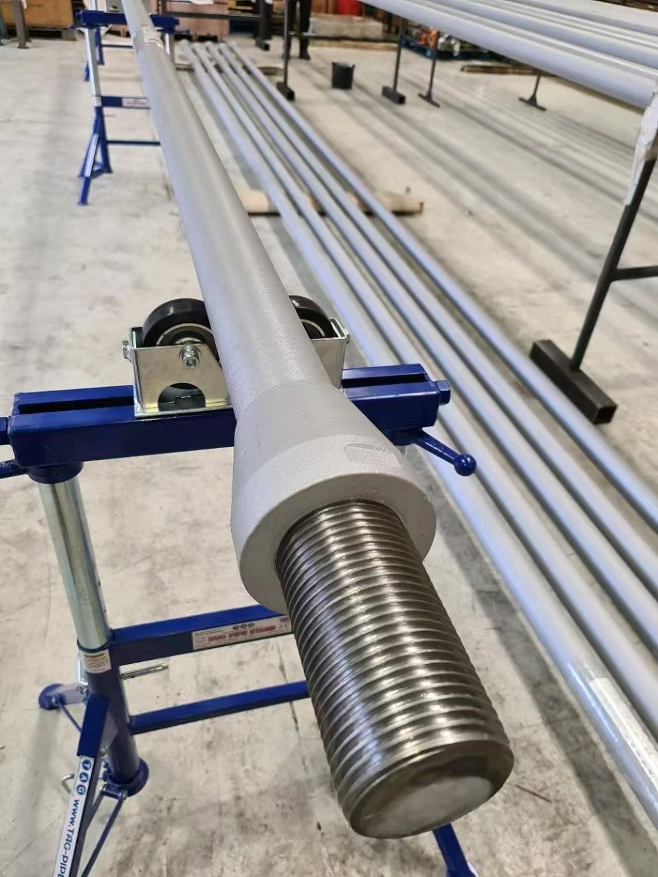 Finished long tension-bar assemblies with formed connection ends