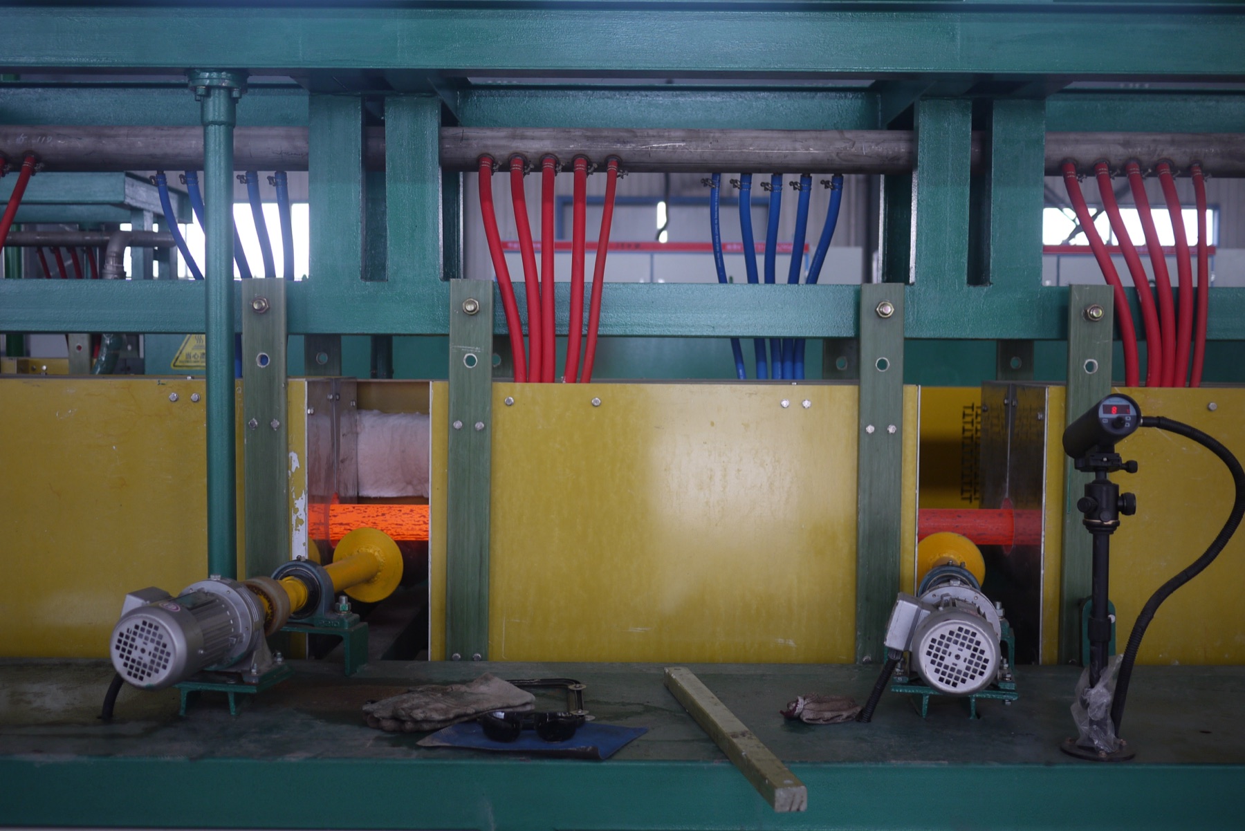 Steel bar heat-treatment line illustrating delivery-condition and section-size control