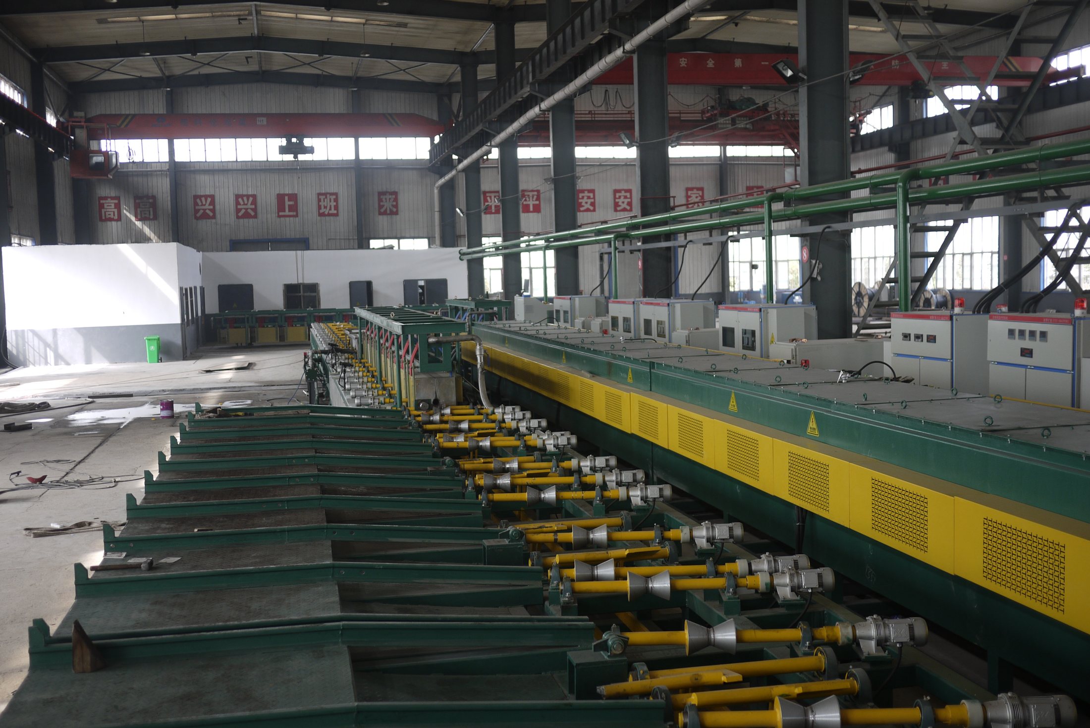 JOTAIN-owned steel-bar processing line inside a factory