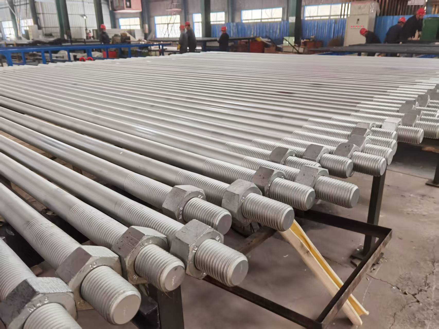 JOTAIN threaded steel rod components prepared for industrial connection applications