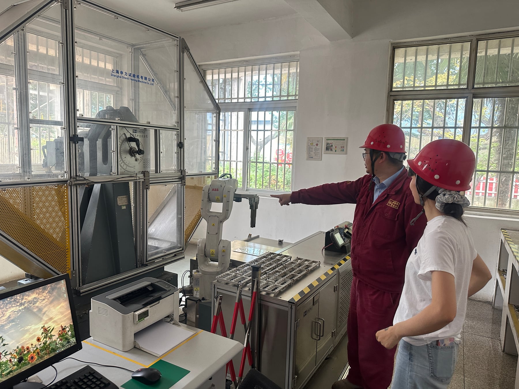 Enclosed impact testing machine in the quality laboratory