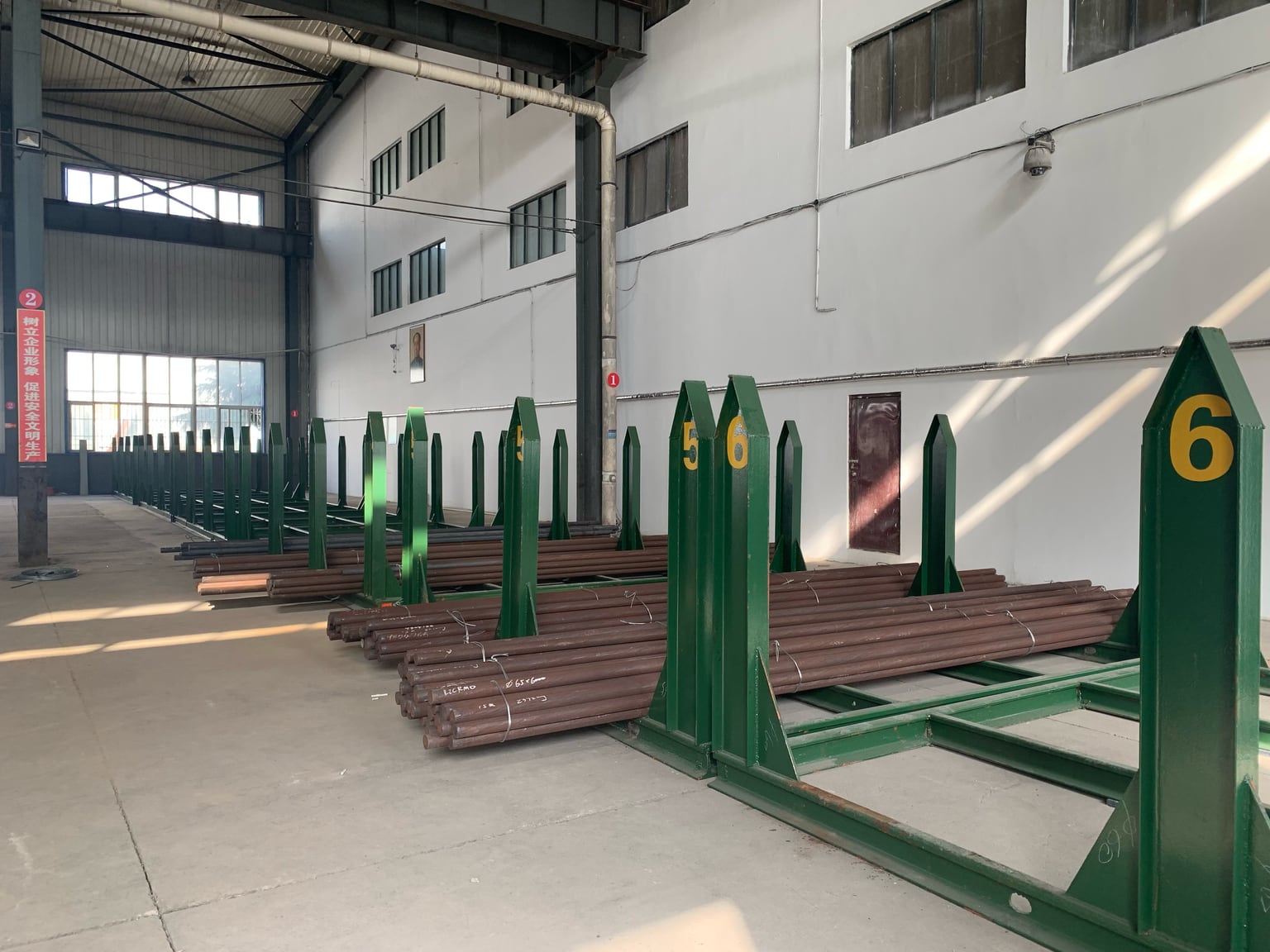 Bundled steel round bars stored in the JOTAIN warehouse